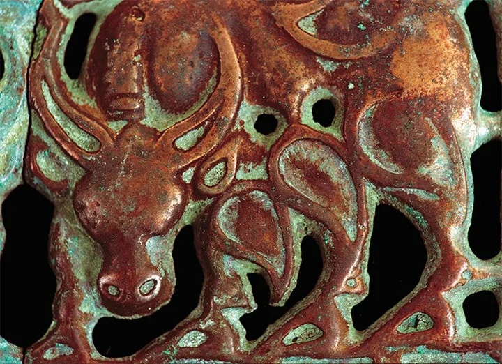 изображения драконов на древних артефактах